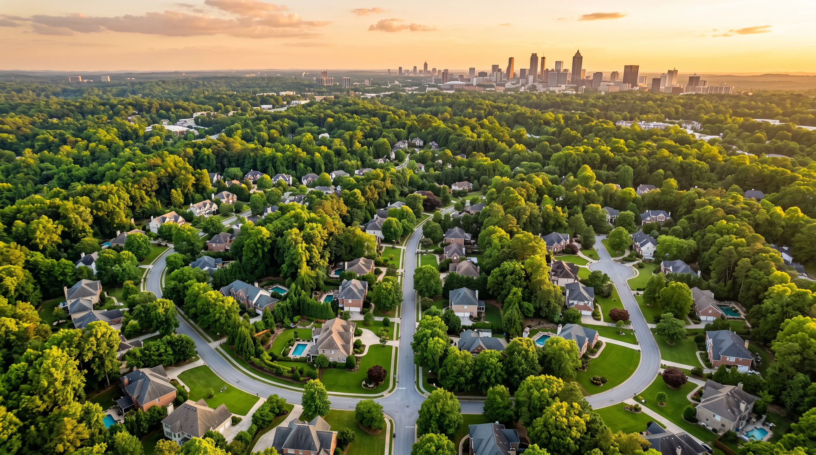 Aerial view of leafy Atlanta suburban neighborhoods at golden hour